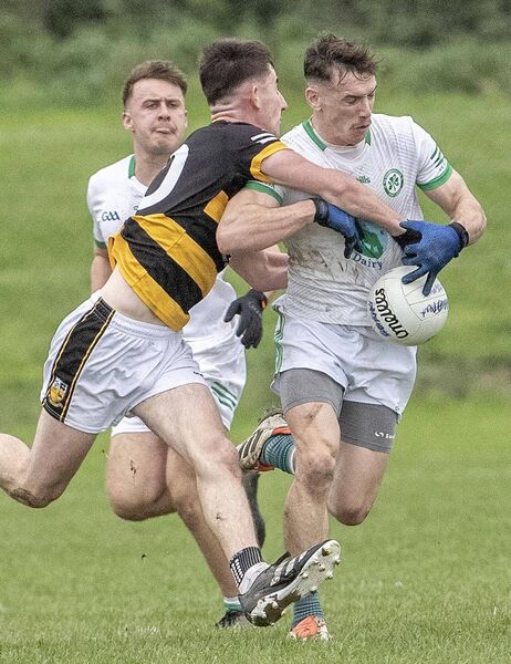 Shamrock's Stephen Lucey is tackled by Buttevant's Aaron Trimm during their Munster Club Junior Football match in Fraher Field. Photo Sean Byrne Shamrock's Stephen Lucey is tackled by Buttevant's Aaron Trimm during their Munster Club Junior Football match in Fraher Field. Photo Sean Byrne