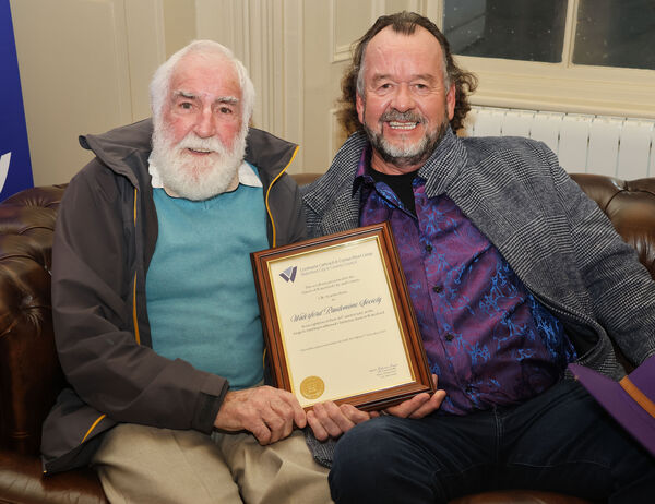  Pictured are Jimmy Kelly and Padraig O Griofa at the reception.