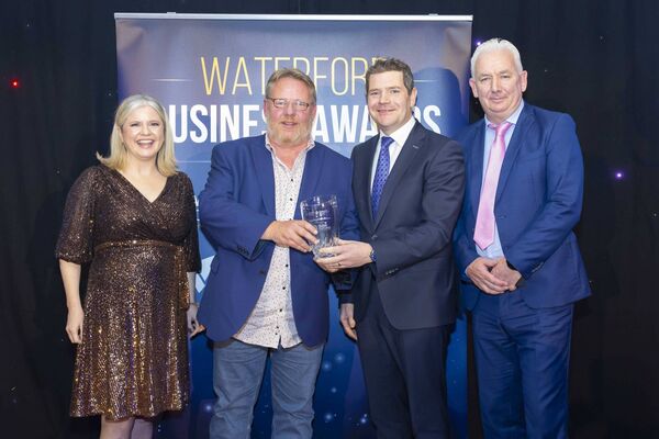 Paul Dower, Waterford in Your Pocket, was honoured with the Think Waterford First Award at the Waterford Business awards. Also pictured are Mary O’Neill, WLR, Peter Burke T.D. Minister for Enterprise, Tourism and Employment and Liam Quinn, CEO Buion Phort Lairge. Photo: Patrick Browne Paul Dower, Waterford in Your Pocket, was honoured with the Think Waterford First Award at the Waterford Business awards. Also pictured are Mary O’Neill, WLR, Peter Burke T.D. Minister for Enterprise, Tourism and Employment and Liam Quinn, CEO Buion Phort Lairge. Photo: Patrick Browne