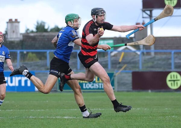 A wonderful catch by Ballygunner's Pauric Mahony to the side of Sarsfields defender Craig Leahy. A wonderful catch by Ballygunner's Pauric Mahony to the side of Sarsfields defender Craig Leahy.