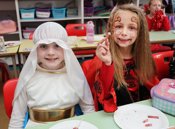 Mary Ann and Vanessa, dressed up for St. Ursula's mid-term Halloween Party. Mary Ann and Vanessa, dressed up for St. Ursula's mid-term Halloween Party.