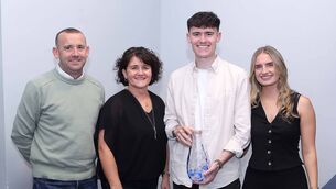 <p>Irish National Marathon champion, David McGlynn pictured with his parents Bernie and Malachy McGlynn and his partner Sarah Bracken.</p>