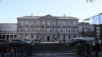 Friends of the Earth set up draughty sitting room outside the Dáil to highlight new Bill