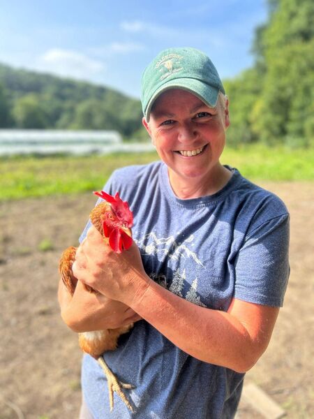 Áine with the chickens. Photo: Jolene Coady