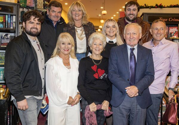 Alfie with members of his family at the Book Centre for the launch of his book 'True Blue'. Photo: Joe Evans