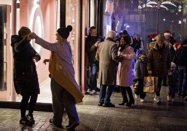 Dancing in the streets at the switching on of the Christmas lights and the start of Winterval.