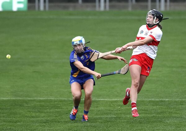 Maggie Gostl's left handed shot flew into the St Finbarr's net late in the game to put De La Salle ahead. Photos: Noel Browne.