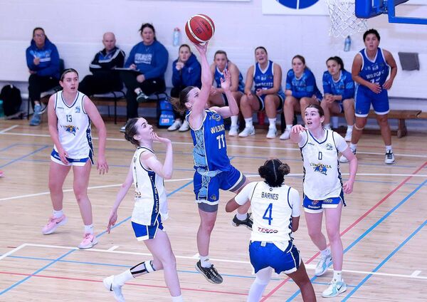 Sanija Brikmane (Wildcats) carves through the Cavan Eagles defence to score. Sanija Brikmane (Wildcats) carves through the Cavan Eagles defence to score.