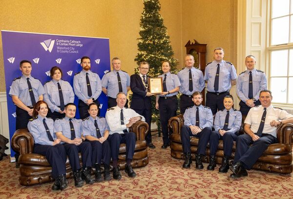 A Mayoral Reception was hosted by the Mayor of Waterford City and County, Cllr. Seamus Ryan, in the Mayor’s Parlour, City Hall, The Mall, Waterford, for Waterford Community Gardaí in recognition of serving the people of Waterford by engaging with local groups, businesses, and organisations to promote and ensure community safety. Garda Ciara Heffernan accepted the scroll on behalf of the Community Gardaí from Mayor Ryan. Photo: Joe Evans A Mayoral Reception was hosted by the Mayor of Waterford City and County, Cllr. Seamus Ryan, in the Mayor’s Parlour, City Hall, The Mall, Waterford, for Waterford Community Gardaí in recognition of serving the people of Waterford by engaging with local groups, businesses, and organisations to promote and ensure community safety. Garda Ciara Heffernan accepted the scroll on behalf of the Community Gardaí from Mayor Ryan. Photo: Joe Evans