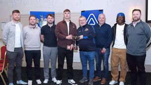<p>Premier Division champions Villa FC captain Luke Walsh receive the trophy from Adrian Flanagan, WDJL and Jack Molloy, Azzurri. Also pictured are Craig Dunphy, Conor Coad, Aaron O'Connor, Paul Morrissey, and John Tamen. Photos: Noel Browne</p>