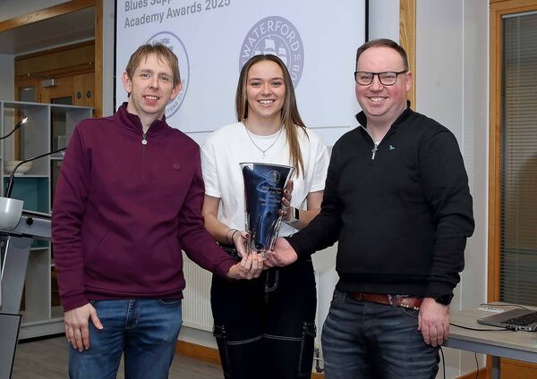 The Blues Supporters Club Senior Women's Player of the Year was Maeve Williams; she is pictured receiving her award from Richard Dobbyn and Owen Power, BSC.