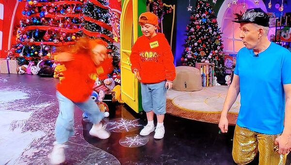George and Ophelia on the Late Late Toy Show, with Ophelia showing Patrick Kiely some of her dance moves learned at Synergy Dance Club.