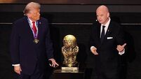 Donald Trump awarded inaugural FIFA peace prize at World Cup draw