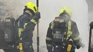 <p>Fire service dealing with a shed fire caused by charging e-scooters. Picture Credit: Waterford City Fire Service on Facebook.</p> <p>Fire service dealing with a shed fire caused by charging e-scooters. Picture Credit: Waterford City Fire Service on Facebook.</p>