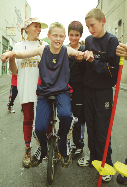 Learning how to ride a Unicycle during Waterford Spraoi 2000 with Fay Callow, of Boggle Entertainments, were Dermot Travers, Grame Cleary and Luigi Orsini. Learning how to ride a Unicycle during Waterford Spraoi 2000 with Fay Callow, of Boggle Entertainments, were Dermot Travers, Grame Cleary and Luigi Orsini.