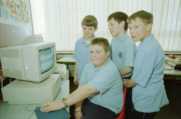  January 2000, History in the making as Tramore Schools to Unite, pitured are David Carroll, Ivan Hartley, Jamie O'Brien and Daniel O'Sullivan, during computer studies and Edmund Rice School.