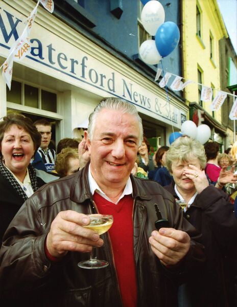 James Coughlan, winner of the Waterford News &amp; Star/ WLRfm great car give-away, together with his wife, Joan, toast their good fortune having won a Toyota Yaris, in the eliminator draw back in 2000.