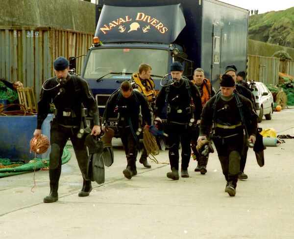 Naval divers who were involved in the operation off the coast of Dunmore East which resulted in the controlled explosion of a Second World War sea mine 800 metres off shore back in 2000.