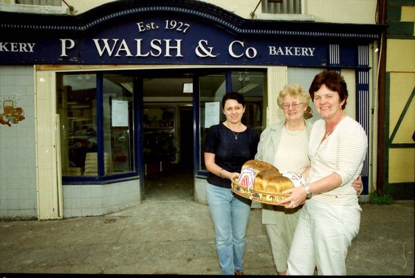 Pictured with a selection of the last batch of bread baked at Walsh's Bakery in Ballybricken back in June 2000 are, Walsh's Bakery shop staff members Sandra Bible, Theresa Walsh and Mary Griffin.