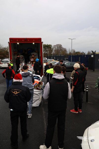 Filling the truck with donations for Make-a-Wish. 