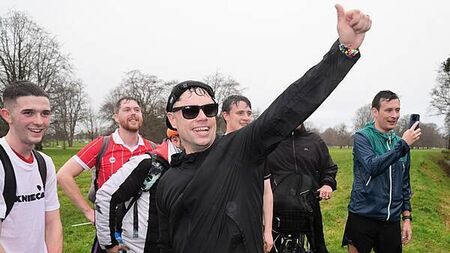 Kneecap’s Móglaí Bap greeted by President Connolly during charity run
