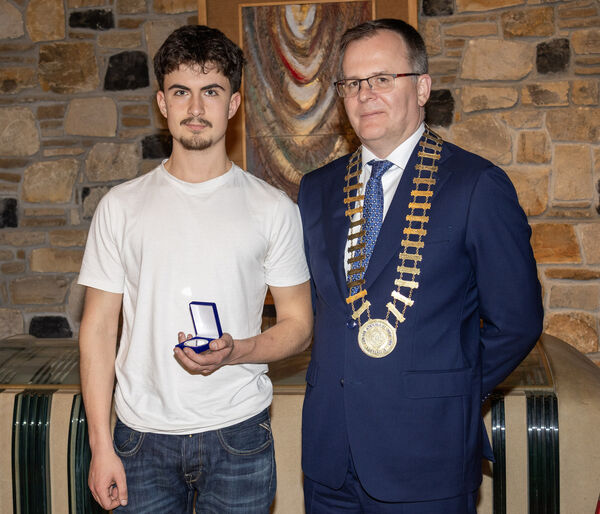 Pictured at the Mount Sion Secondary annual awards evening were Samy Alem, Best Leaving Cert, and Pat Burke, president PPU. Pictured at the Mount Sion Secondary annual awards evening were Samy Alem, Best Leaving Cert, and Pat Burke, president PPU.