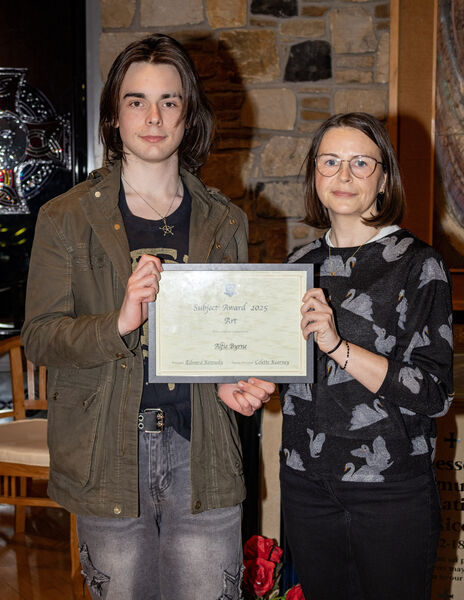 Pictured at the Mount Sion Secondary annual awards evening were student Alfie Byrne receiving his award from Gemma Kennedy. Pictured at the Mount Sion Secondary annual awards evening were student Alfie Byrne receiving his award from Gemma Kennedy.