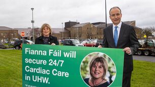 <p>Taoiseach Micheál Martin and Minister Mary Butler promising 24/7 cardiac care nine years ago.</p>