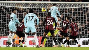 Liverpool hold off late challenge for dramatic win over nine-man Tottenham