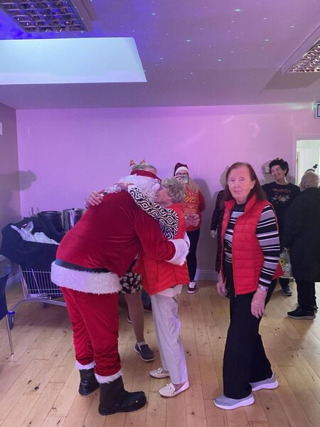 Santa had presents and hugs for everyone! 