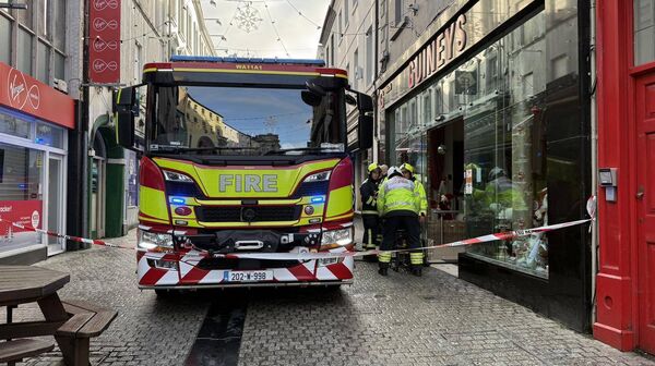 Fire service outside Guineys. Picture Credit: Waterford City Fire Service on Facebook.