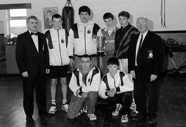 Saviours Crystal Boxing Club emerged as the 1996 winners of the Best Club in Waterford and Tipperary. They entered 10 boxers and won 10 County Championships at junior level, with five boxers chosen to represent Munster, standing, Miles Lavery, Chairman, Keith Walsh, Francie Troy, Coach, Raymond Stone, Sean Sanpedro and Martin Hanrahan, Club Timekeeper, front, Keith Whelan and Paul Simpson. Saviours Crystal Boxing Club emerged as the 1996 winners of the Best Club in Waterford and Tipperary. They entered 10 boxers and won 10 County Championships at junior level, with five boxers chosen to represent Munster, standing, Miles Lavery, Chairman, Keith Walsh, Francie Troy, Coach, Raymond Stone, Sean Sanpedro and Martin Hanrahan, Club Timekeeper, front, Keith Whelan and Paul Simpson.