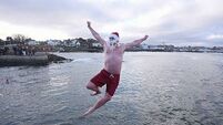 Crowds brave chilly temperatures for Christmas Day swim