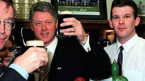 White House did not want photo of Clinton shaking Adams’ hand during 1995 visit