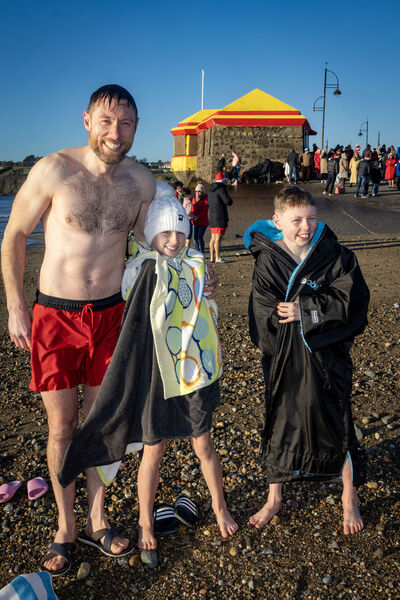  Paudie, Eva and Luke Nevin, at the annual Christmas Day Swim, at Tramore. Photo: Joe Evans