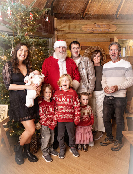  Santa paid a surprise visit to Moes Tramore and is pictured here with members of the Quinlan family. Photo: Joe Evans