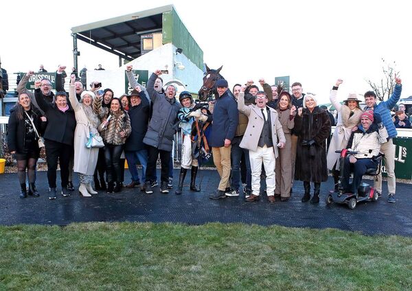 The winner of the Tom Carroll Memorial Handicap Steeplechase was the John Flavin trained Ag Obair Go Crua ridden by Darragh O'Keeffe and they are pictured with the winning Tus Maith Syndicate.