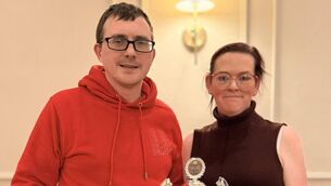 <p>Waterford's Vinny Keane being presented with his silverware following his two wins at the 2025 Visually Impaired Tennis National Finals</p>