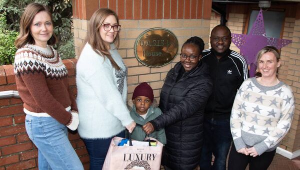 Pictured are the The Momodu family Mary, Buhari and their son Maceo, making a donation to Oasis House, represented by Louise Kelly, Assistant Manager, Rachel Jacob, Senior Refuge Worker and Michelle Fenton, Child, Youth and Family Worker. Photo: John Power Pictured are the The Momodu family Mary, Buhari and their son Maceo, making a donation to Oasis House, represented by Louise Kelly, Assistant Manager, Rachel Jacob, Senior Refuge Worker and Michelle Fenton, Child, Youth and Family Worker. Photo: John Power
