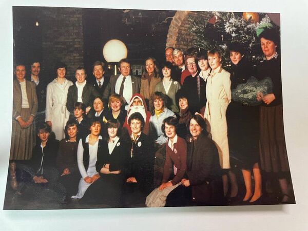 Proprietors and staff of George's Court Shopping Centre at Christmastime in the early 1980s.