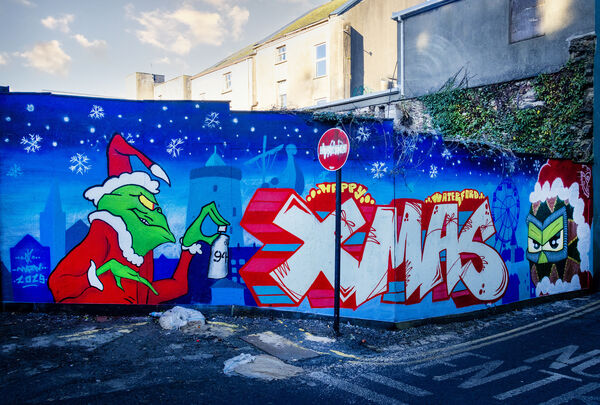  Laidback Design and Wayron created a piece of festive art at Meeting House Lane. Photo: Joe Evans