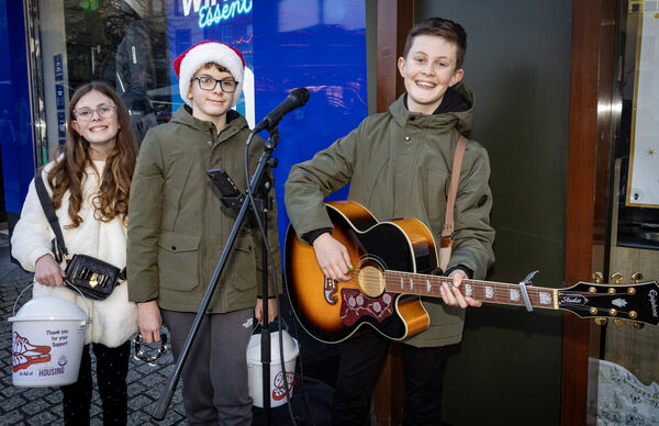  Sophia O'Byrne, Ben O'Brien and Max O'Byrne, supporting Busk Aid in aid of Tintean Housing. Photo: Joe Evans