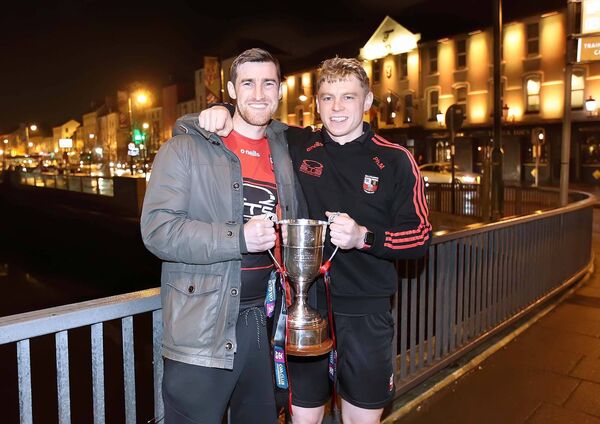 History makers, Ballygunner joint captains, Barry Coughlan and Philip Mahony pictured with the All-Ireland senior club championship cup on Rice Bridge after their win in Croke Park against Ballyhale Shamrocks back in 2022. Photo: Noel Browne