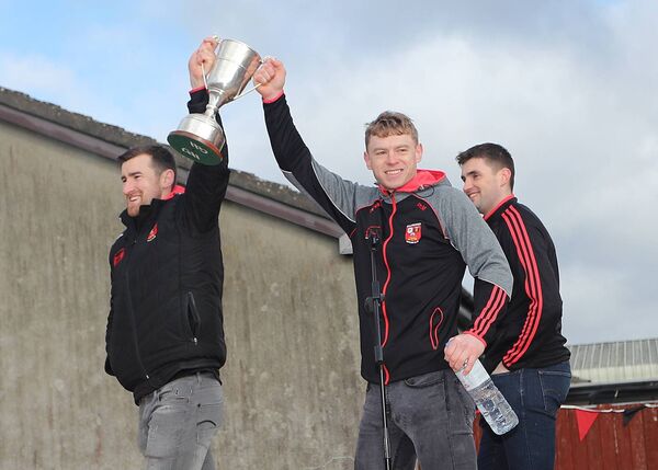 Joint captains Philip Mahony and Barry Coughlan bring the Thomas Moore Cup back to Ballygunner NS back in 2022. Photo: Maurice Hennebry
