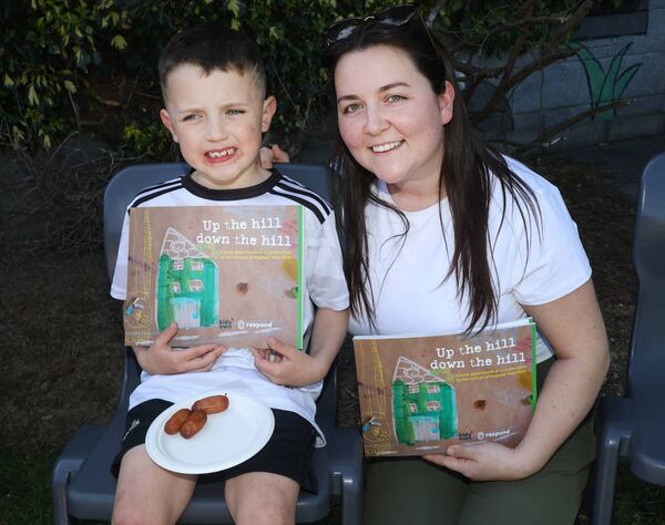 Noah Walsh and Donna Cowman, pictured at Killue Grove to launch, Up the hill down the hill, a book about homes and communities by the children of Respond Waterford. Photo: Joe Evans