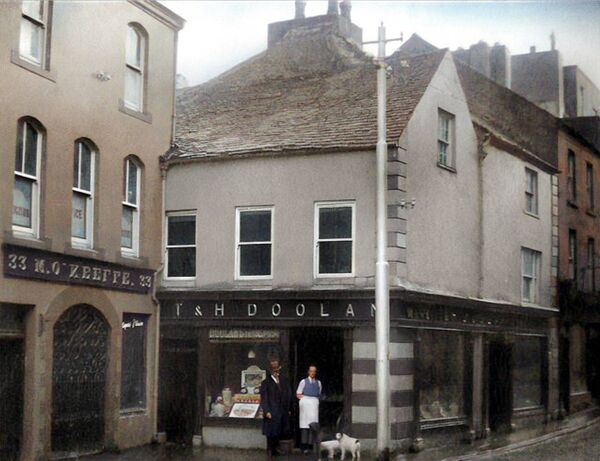 c1940, T&amp;H Doolan’s T &amp; H Doolan corner on Great George’s Street stands at the heart of history, with its back wall incorporating remnants of the ancient Anglo-Norman city walls. It was once owned by Liam Clancy of the Clancy Brothers. In the 1980s, thanks to Joe Falvey, the iconic tavern hosted some of the earliest performances of a 16-year-old unknown Sinead O’Connor…and the rest, as they say, is music history! 