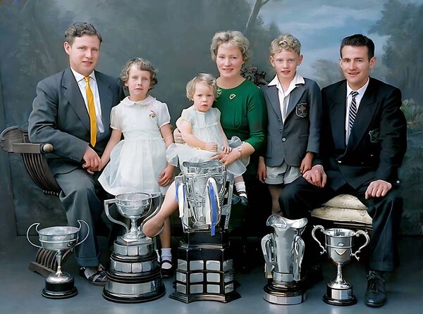 1959, Home with Liam Christy &amp; Nancy Walsh, with children Margaret, Maria and David, with Frankie Walsh, Captain of Waterford's 1959 All Ireland Hurling Winning Team, posing proudly with the Liam MacCarthy Cup – local pride and national glory, looking especially good all dressed in Waterford's white &amp; blue. Photo: Annie Brophy 