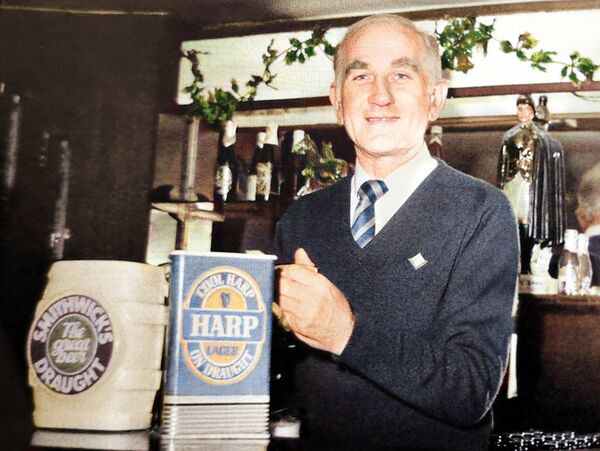1980s, Philly over the Bar Waterford hurling legend Philly Grimes pictured at his own bar in 1980’s Waterford. A celebrated local establishment, the bar became synonymous with his name and warm hospitality, blending sport and community. Grimes, who was a regular member of the starting 15, won two All-Ireland medals, three Munster medals and one National Hurling League medal on the field of play. He was an All-Ireland runner-up on two occasions. 