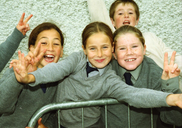  Children from St. Saviour's Primary School show their excitement as they await the arrival of President McAleese in Ballybeg back in 2000.