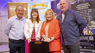 <p>Tony, Ann, Brenda and Paul Corcoran, with the seat dedicated to their late dad Denny Corcoran. Photo: Joe Evans</p>